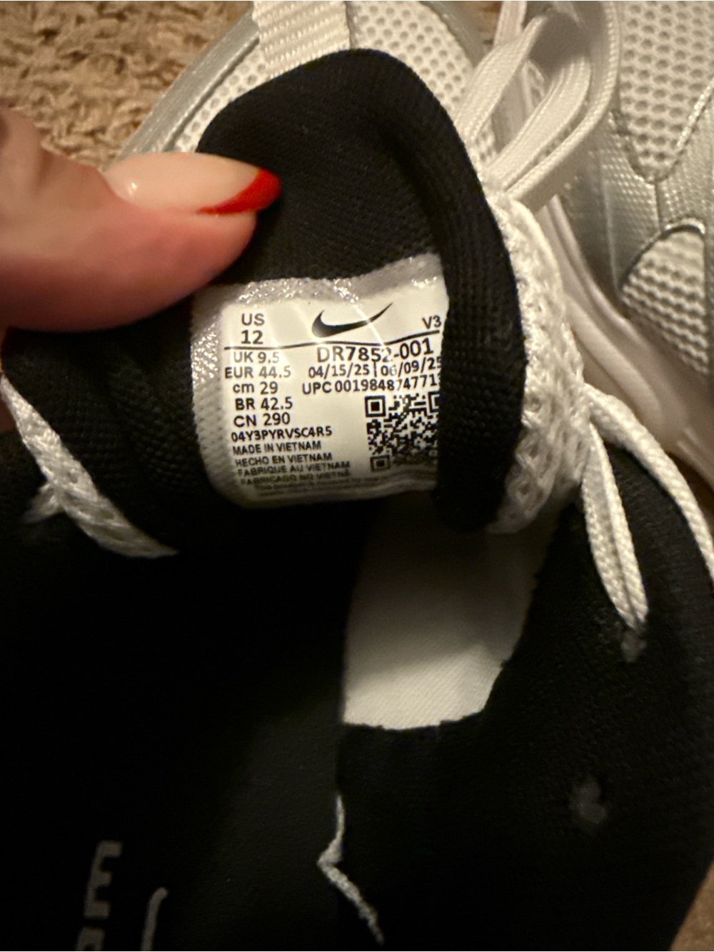 Nike Women’s White and Black Lace-Up Sneakers